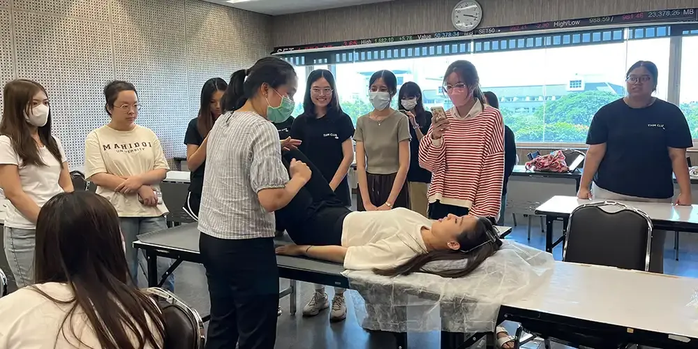 THM Club Holds Workshop on Easing Back Pain